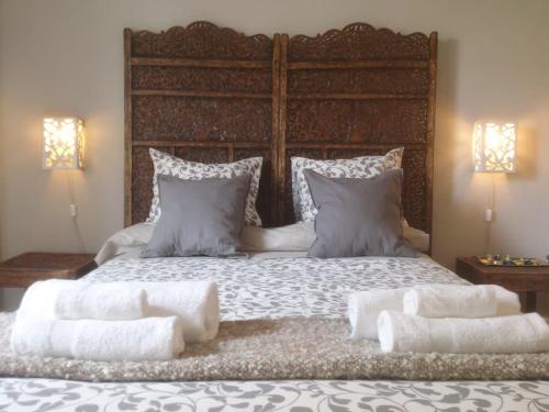 En eller flere senge i et værelse på Terraza a los pies de la Alhambra