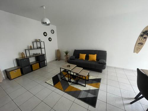 Posezení v ubytování À deux pas de la mer