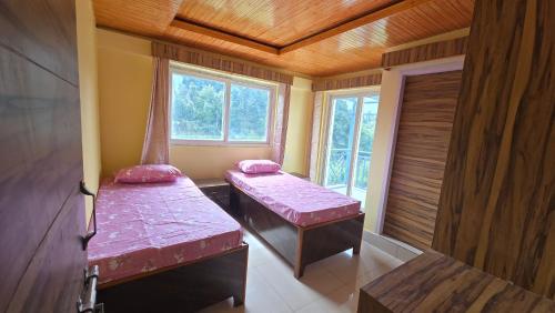 Ένα ή περισσότερα κρεβάτια σε δωμάτιο στο Tapas