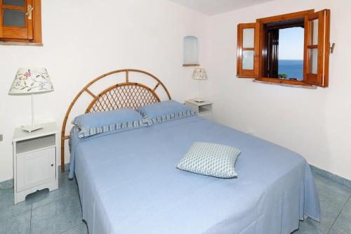 Una cama o camas en una habitación de Trulli Sul Mare