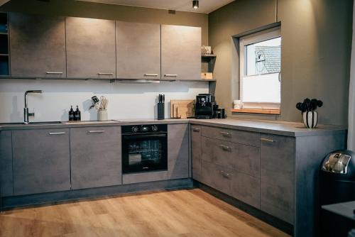 Η κουζίνα ή μικρή κουζίνα στο Traumnest Eifel