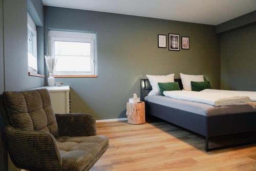 Ένα ή περισσότερα κρεβάτια σε δωμάτιο στο Traumnest Eifel