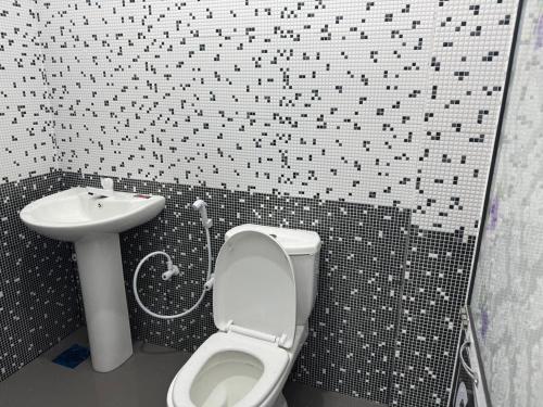 Koupelna v ubytování Mark International