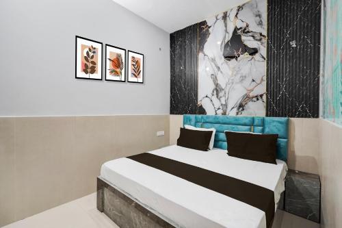 Ένα ή περισσότερα κρεβάτια σε δωμάτιο στο Hotel O Grand Hotel