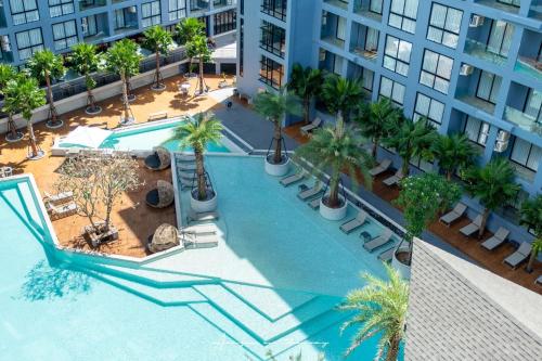 an overhead view of a swimming pool in a building at The Kamala View in Kamala Beach