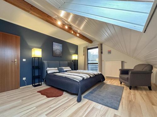 Ένα ή περισσότερα κρεβάτια σε δωμάτιο στο Böhmerwaldnest