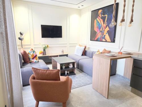 TV/trung tâm giải trí tại Casablanca METROPOL Suites