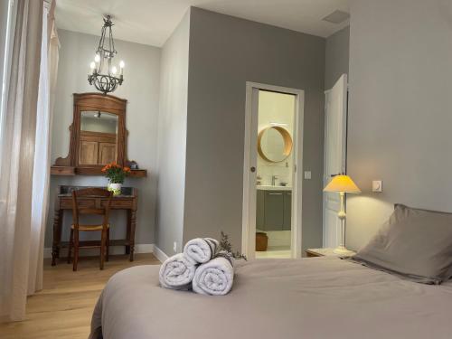 Postel nebo postele na pokoji v ubytování Maison Thalie