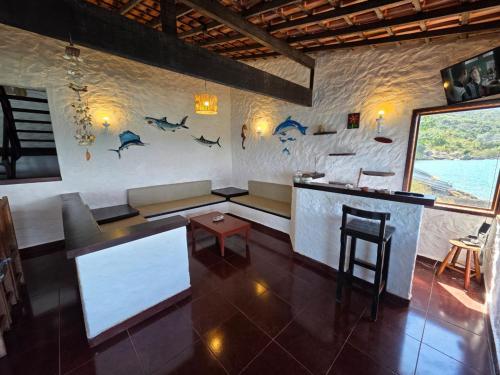 Giường trong phòng chung tại Casa Bela Vista Ilha de Jaguanum