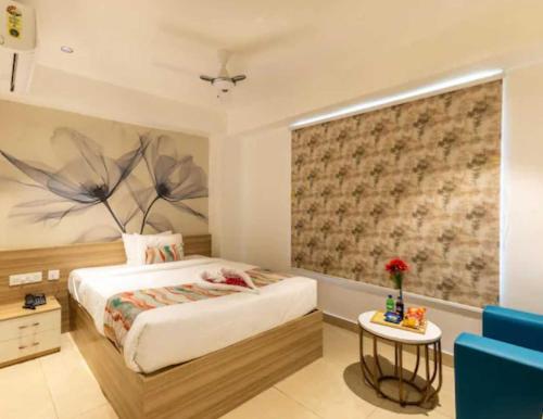 Ένα ή περισσότερα κρεβάτια σε δωμάτιο στο POP 84109D Hotel O Near Jodimetla X Roads