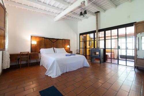 Кровать или кровати в номере Estancia La Cinacina