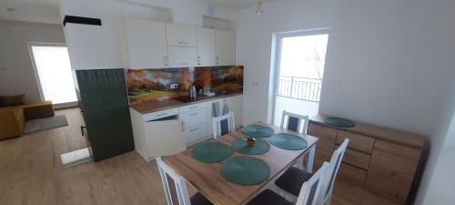 Kuchyň nebo kuchyňský kout v ubytování Domek pod Gorcami