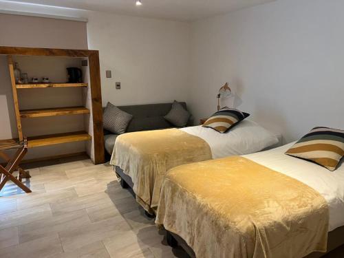 Cama o camas de una habitación en Hotel Casa Surf