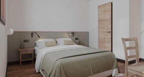 Ένα ή περισσότερα κρεβάτια σε δωμάτιο στο My Rooms Las Salas by My Rooms Hotels - Hotel Boutique