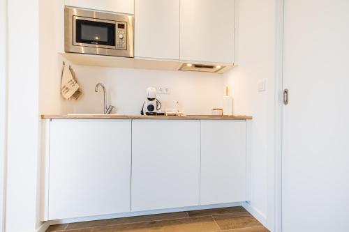 Η κουζίνα ή μικρή κουζίνα στο Azores Cozy Suite, Romantic, Free Parking