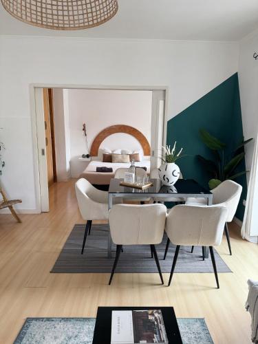 a dining room with a table and chairs at Central Lisbon Apartment in Mouraria in Lisbon