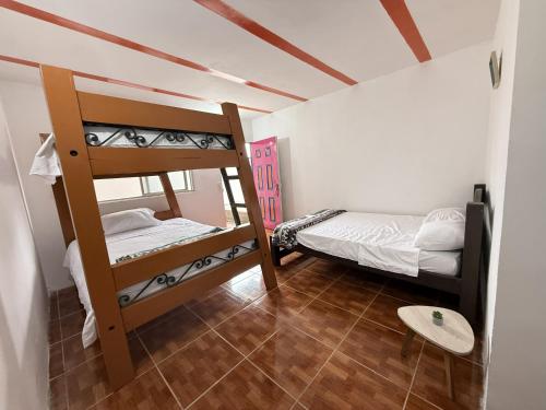 Postel nebo postele na pokoji v ubytování Mirador Verde By Nala