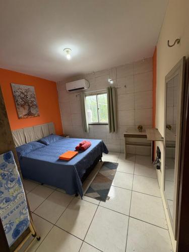 Ένα ή περισσότερα κρεβάτια σε δωμάτιο στο Apartamento completo e central! Casa Rute!