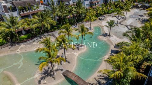 Penthouse vue piscine lagon, 200m de la plage