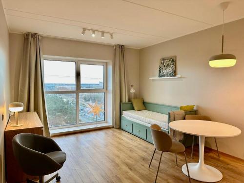 Χώρος καθιστικού στο Studio apartment with gym and coworking space