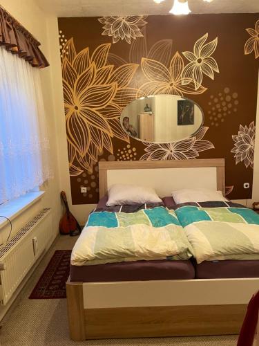 Ένα ή περισσότερα κρεβάτια σε δωμάτιο στο Bunte Stadt an der Elde 3