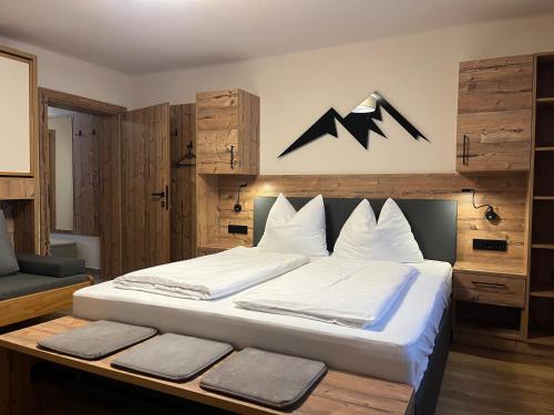 Postel nebo postele na pokoji v ubytování Boutique Apartment BERGLIEBE, ski in-out