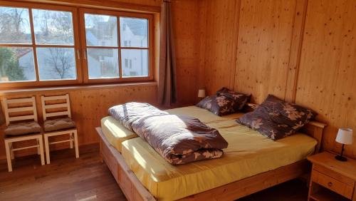 Postel nebo postele na pokoji v ubytování Ferienglück Allgäu Apartment Amelie