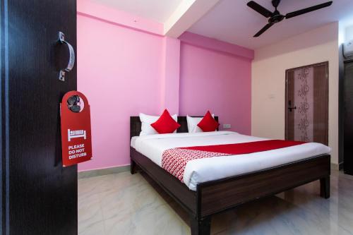 Ένα ή περισσότερα κρεβάτια σε δωμάτιο στο Hotel O Decision