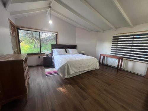 Postel nebo postele na pokoji v ubytování Hospedaje el juncal