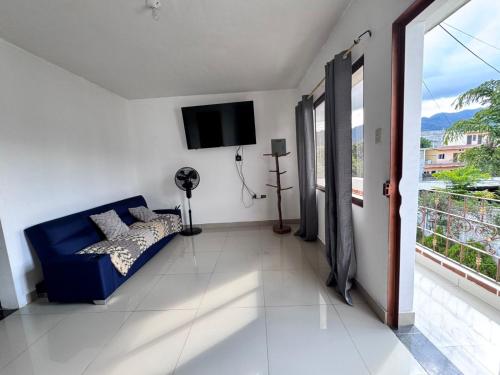 TV a/nebo společenská místnost v ubytování Casa sagrada familia