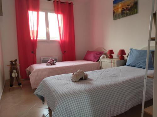 En eller flere senge i et værelse på Appartement Amaryllis