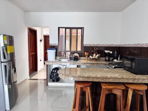 Kuchyň nebo kuchyňský kout v ubytování Casa sagrada familia