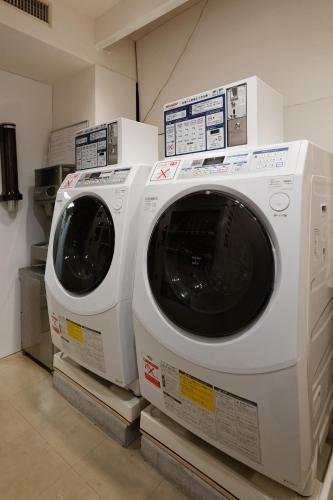 two washing machines stacked on top of each other at Kagoshima Washington Hotel Plaza in Kagoshima