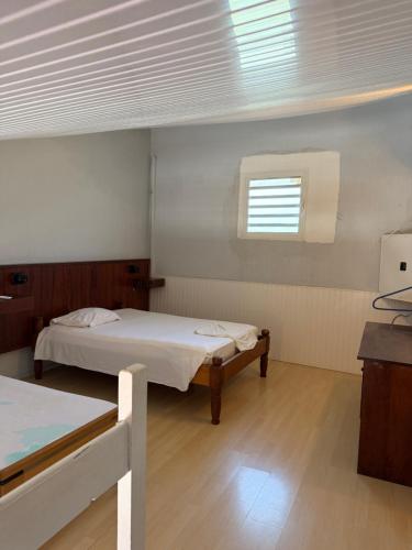 Postel nebo postele na pokoji v ubytování Le Joyeux