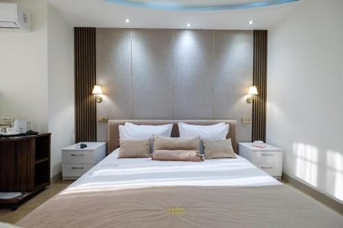 Postel nebo postele na pokoji v ubytování Time Hotel
