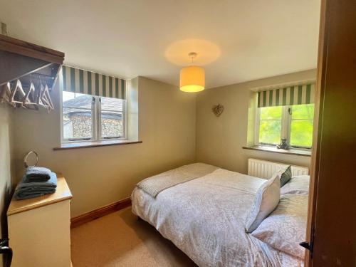 Ένα ή περισσότερα κρεβάτια σε δωμάτιο στο The Hen House