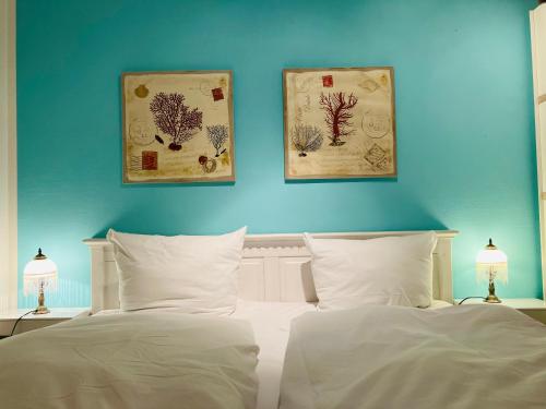 Ένα ή περισσότερα κρεβάτια σε δωμάτιο στο Ostsee Ferienappartement Dierhagen-Strand