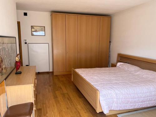 Postel nebo postele na pokoji v ubytování Villa Grumes by Sunhome Fiemme