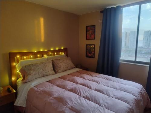 Postel nebo postele na pokoji v ubytování La mejor vista de cavancha