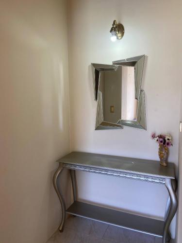 Ένα ή περισσότερα κρεβάτια σε δωμάτιο στο Hostería El Paraíso