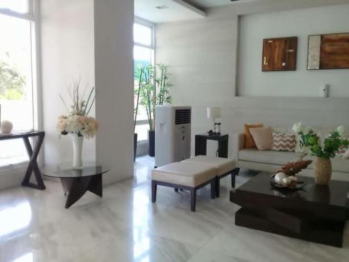 Zona de estar de Staycation near Sucat Toll Gate