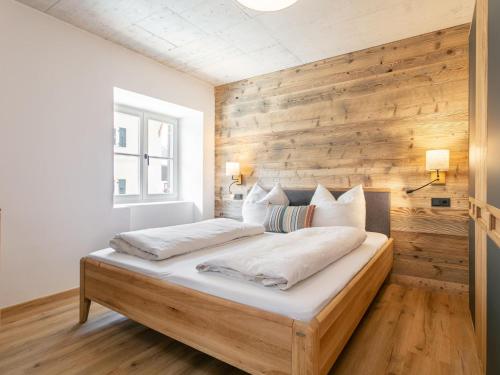 Ένα ή περισσότερα κρεβάτια σε δωμάτιο στο Hopfgarten Alpin Living Top 1 und 2