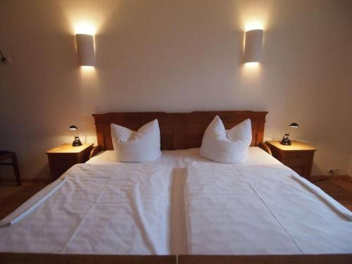 Ένα ή περισσότερα κρεβάτια σε δωμάτιο στο holiday apartment with 2 bedrooms