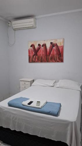 En eller flere senge i et værelse på Hotel Vitoria de Pedreira