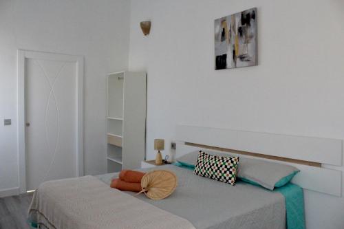 a bedroom with a bed in a room at Casa Billota in Torrox
