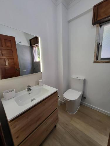 a bathroom with a sink and a toilet at Double Room near Lisbon & Sintra in Queluz