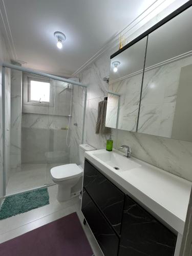 Et badeværelse på Apartamento Centro Torres Jose Bonifacio