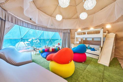 Posezení v ubytování リバーサイドグランピングNuts