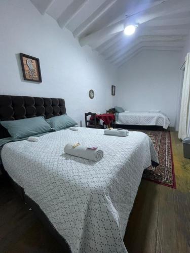 Giường trong phòng chung tại Casona Tres Reyes