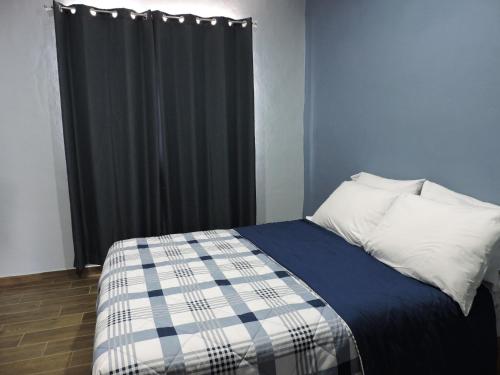 Een bed of bedden in een kamer bij Silver Mountain House